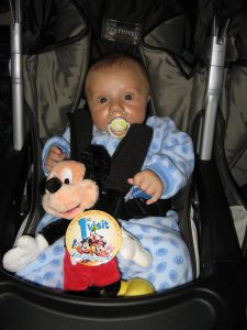 Ethan on first trip to disney with 1st visit button