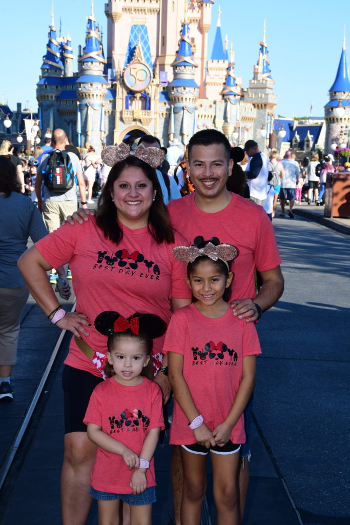 Marelly Campos with family at Magic Kingdom