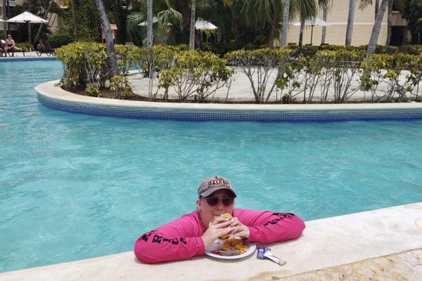 Teen in Pool on Vacation