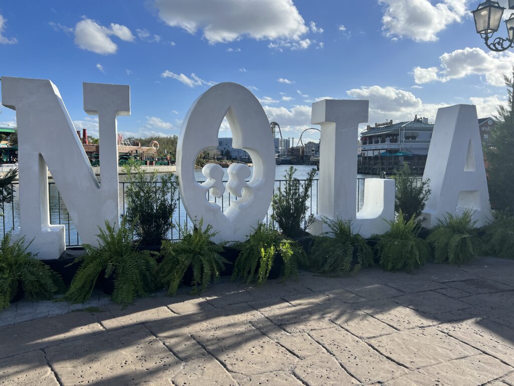 NOLA sign at Universal Orlando Mardi Gras celebration