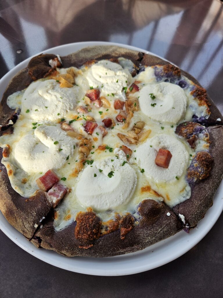 Purple Pizza at Pizza Moon at Epic Universe