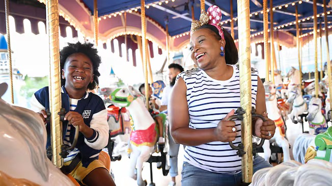 Walt Disney World On-Site Benefits with guests on carousel at Magic Kingdom